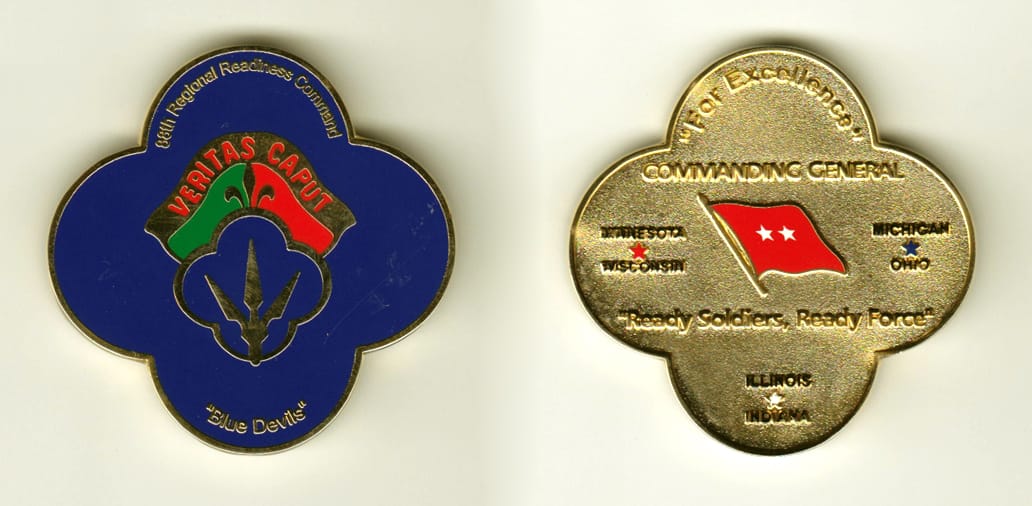 Four circles intersecting shaped, gold colored coin, 2 inches wide x 1-7/8 inches high.