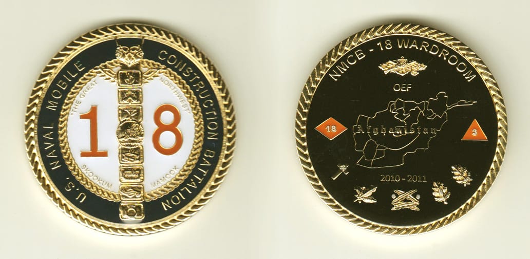 Round shaped, gold colored coin, 2 inches in diameter.