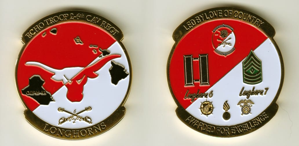 Round shaped, gold colored coin, 2 inches in diameter.