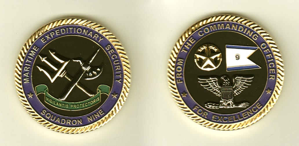 Round shaped, gold colored coin, 1-3/4 inches in diameter.