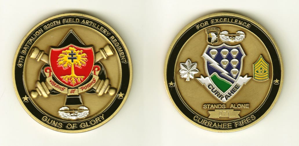 Round shaped, brass colored coin, 2 inches in diameter.