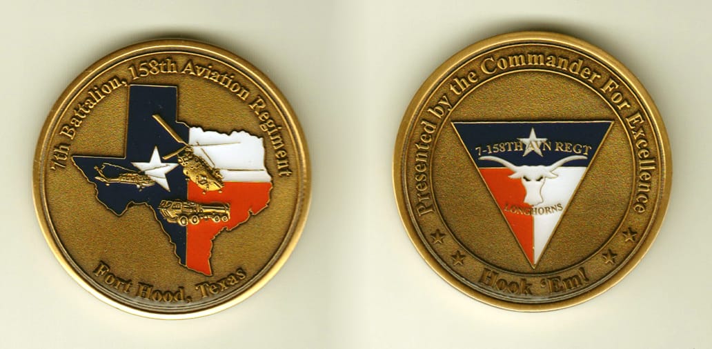 Round shaped, brass colored coin, 1-3/4 inches in diameter.