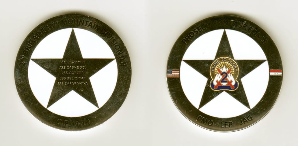 Round shaped, silver colored coin, 1-3/4 inches in diameter.