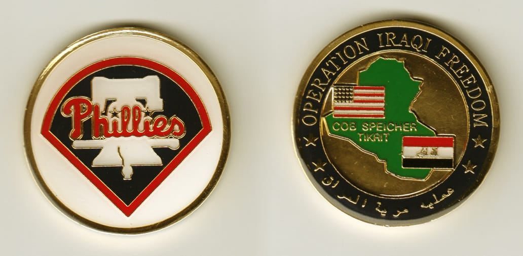 Round shaped, gold colored coin, 1-5/8 inches in diameter.