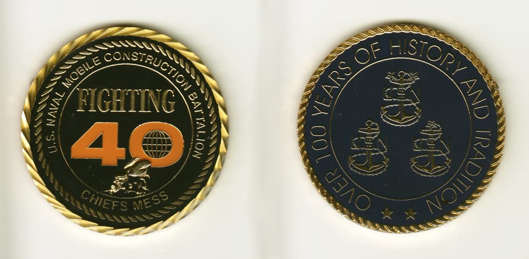 Round shaped, gold colored coin, 2 inches in diameter.