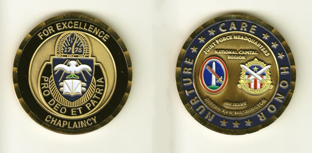 Round shaped, brass colored coin, 2 inches in diameter.