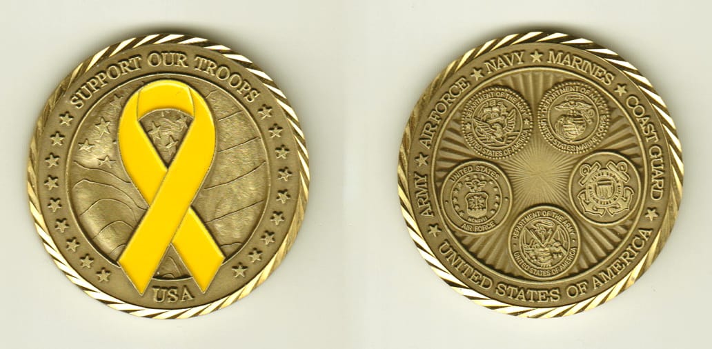 Round shaped, brass colored coin, 1-3/4 inches in diameter.