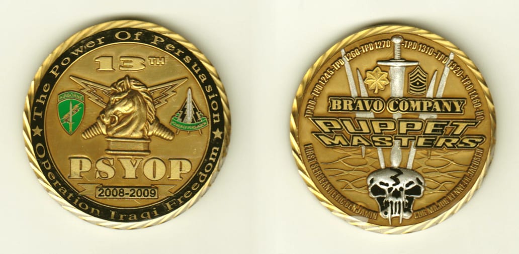 Round shaped, brass colored coin, 2 inches in diameter.