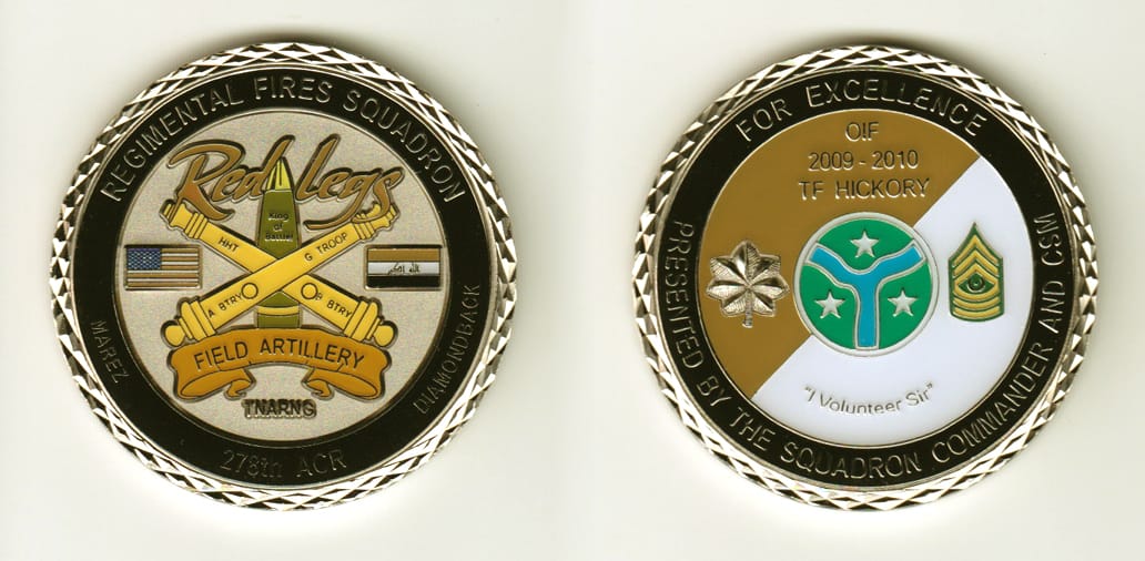 Round shaped, gold colored coin, 2 inches in diameter.