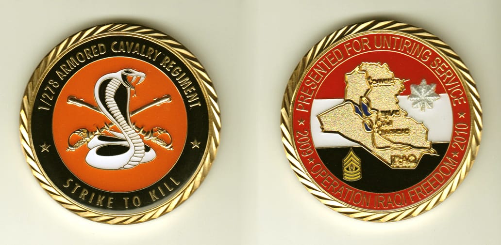 Round shaped, brass colored coin, 2 inches in diameter.