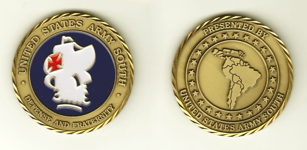 Round shaped, brass colored coin, 2 inches in diameter.