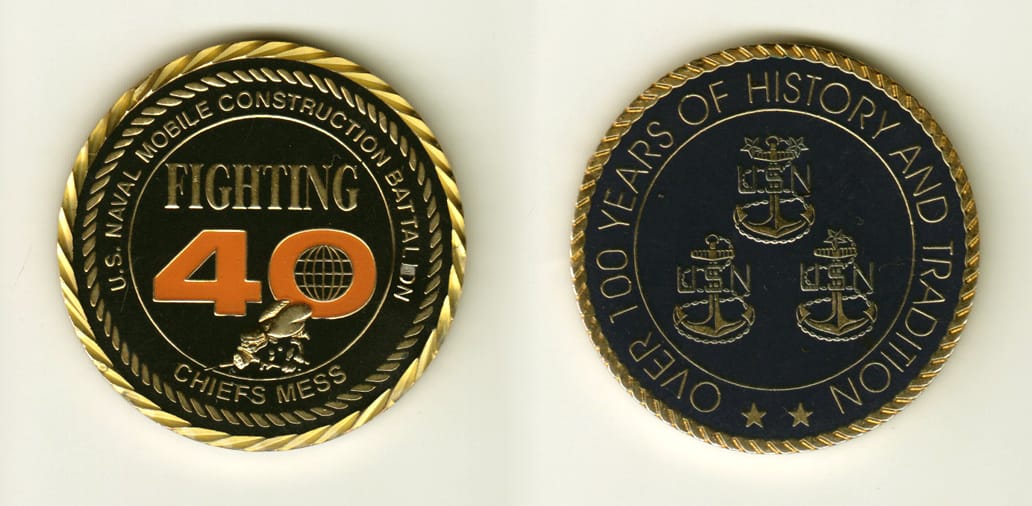 Round shaped, gold colored coin, 2 inches in diameter.