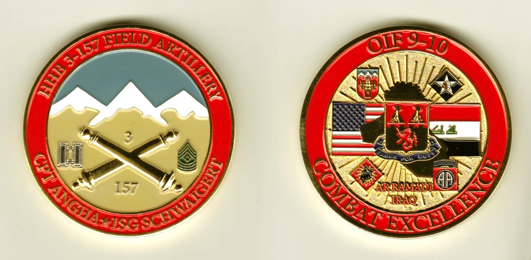 Round shaped, gold colored coin, 2 inches in diameter.