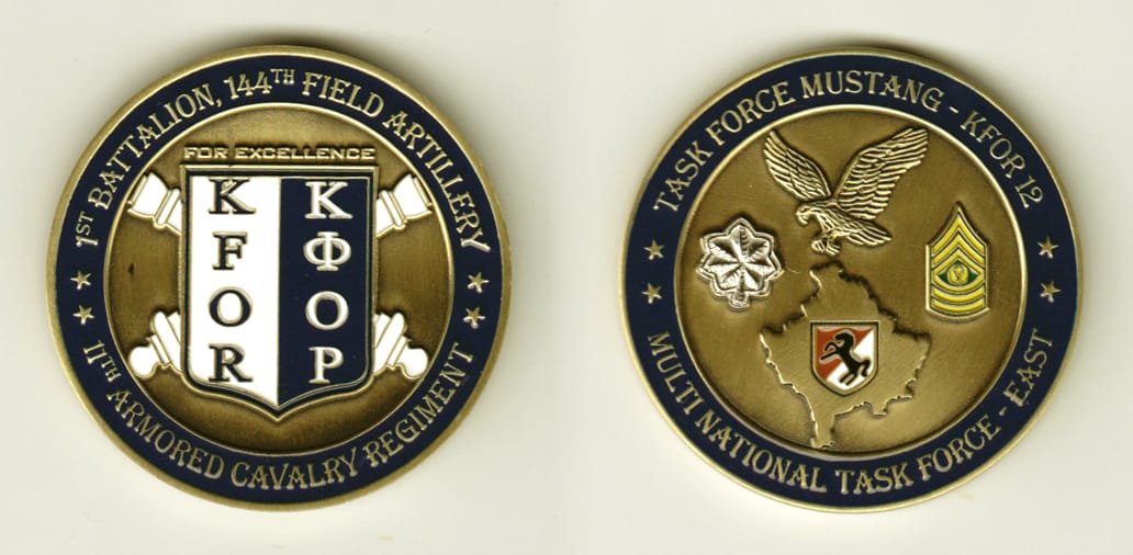 Round shaped, brass colored coin, 2 inches in diameter.