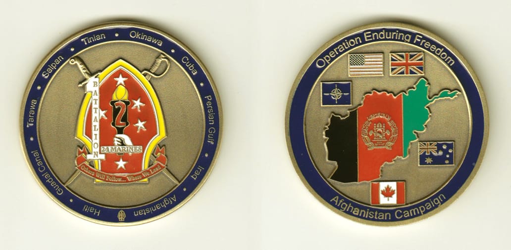 Round shaped, brass colored coin, 2 inches in diameter.