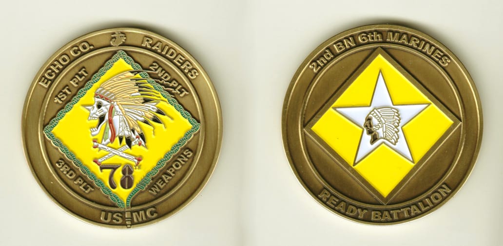 Round shaped, brass colored coin, 2 inches in diameter.