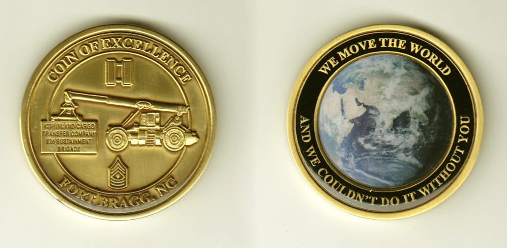 Round shaped, brass colored coin, 1-3/4 inches in diameter.