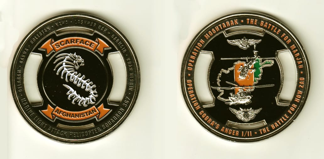 Round shaped, silver colored coin, 2-3/4 inches in diameter.