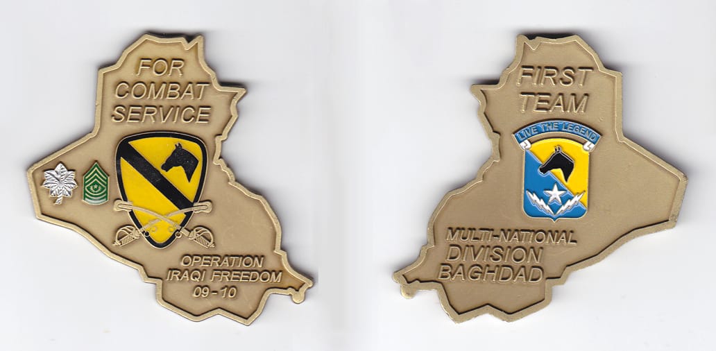 Iraq shaped, brass colored coin, 2-3/4 inches wide x 2-1/2 inches high.