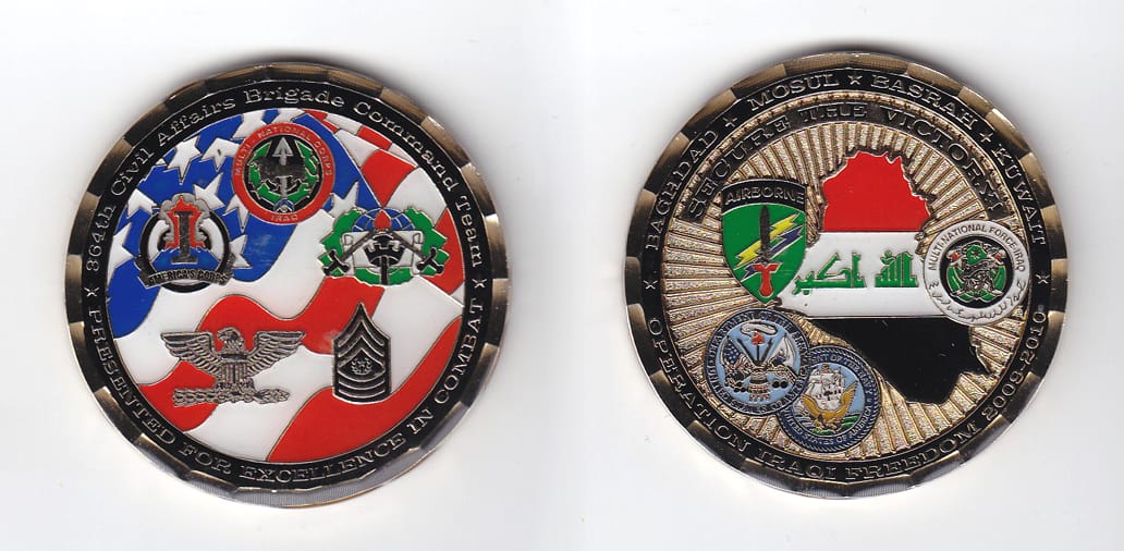 Round shaped, gold colored coin, 2 inches in diameter.