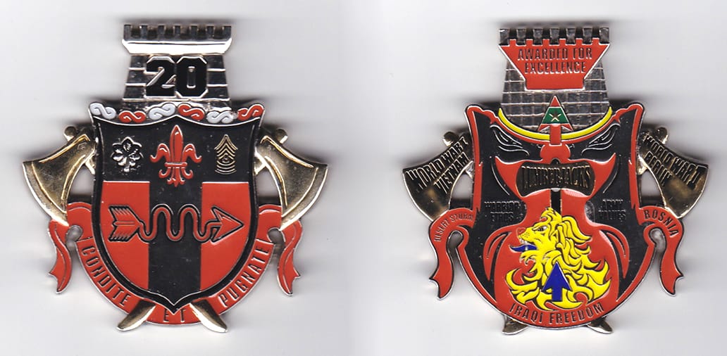 Shield shaped, with banner mounted beneath, Castle turret mounted above and crossed axes extending, silver colored coin,...