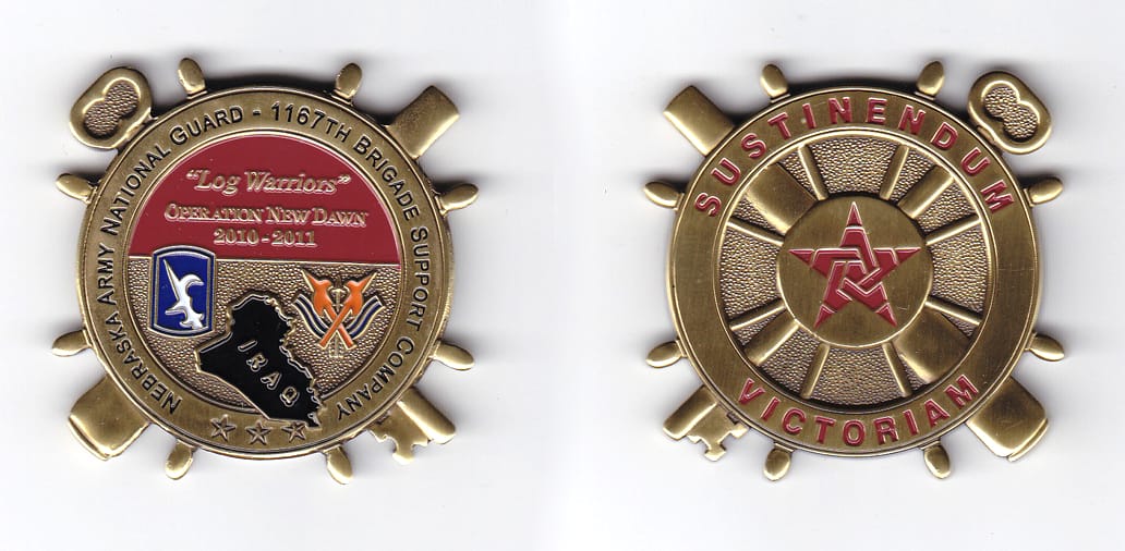 Ship's wheel shaped with crossed key and cannon extended, brass colored coin, 2-1/8 inches in diameter.