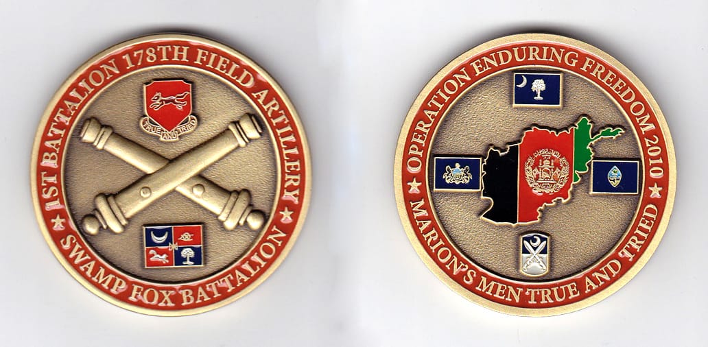 Round shaped, brass colored coin, 2 inches in diameter.