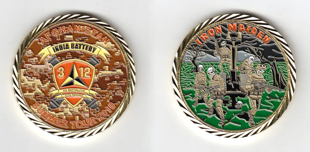 Round shaped, gold colored coin, 2 inches in diameter.