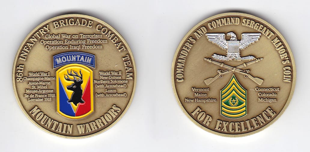 Round shaped, antique brass colored coin, 2 inches in diameter.