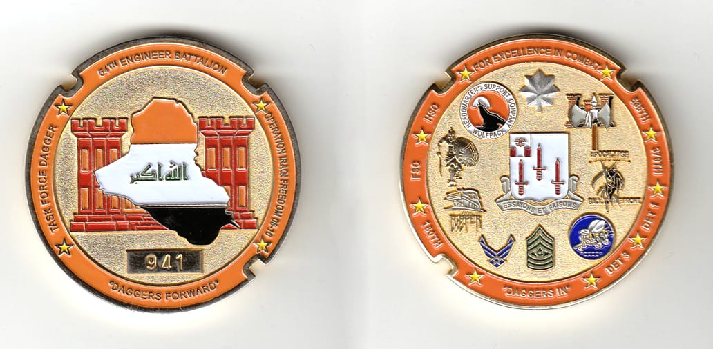 Round shaped, gold colored coin, 2 inches in diameter.