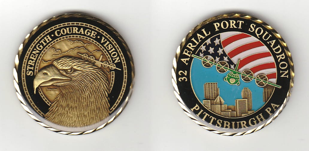 Round shaped, brass colored coin, 1-7/8 inches in diameter.