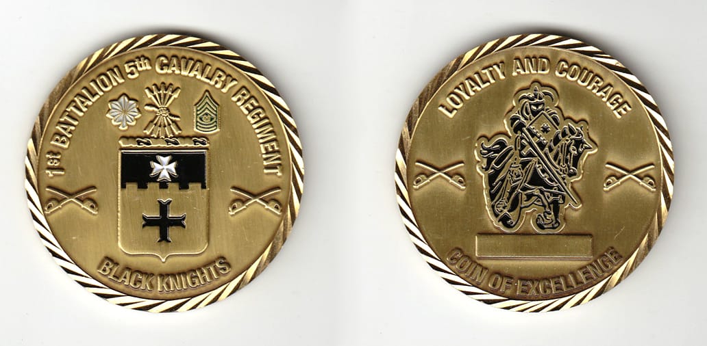 Round shaped, brass colored coin, 2 inches in diameter.