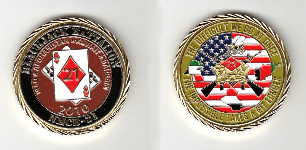 Round shaped, gold colored coin, 2 inches in diameter.