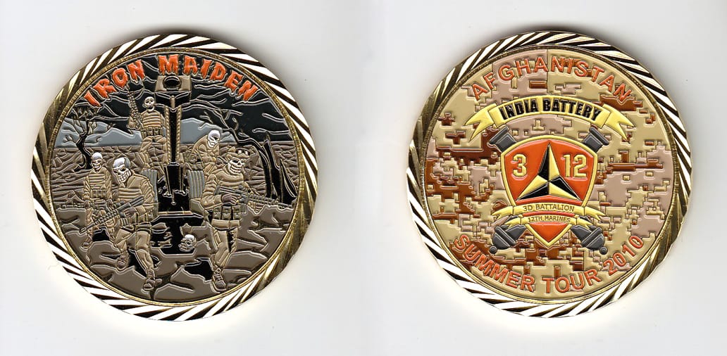 Round shaped, gold colored coin, 2 inches in diameter.