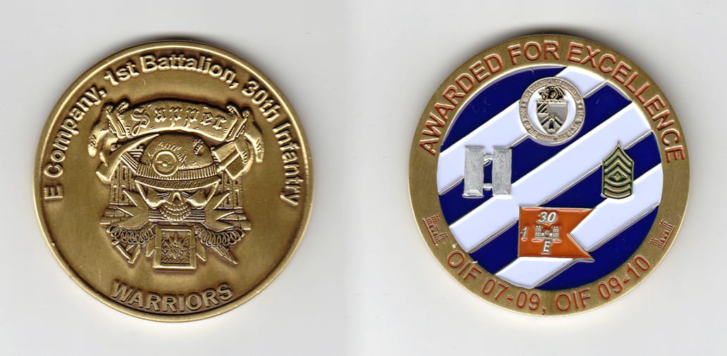 Round shaped, brass colored coin, 2 inches in diameter.