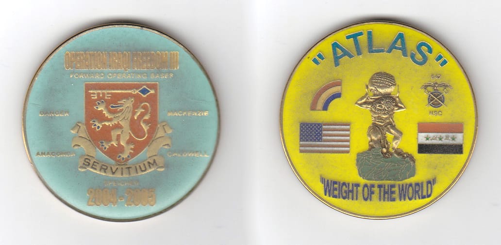 Round shaped, brass colored, enameled coin, 2 inches in diameter.