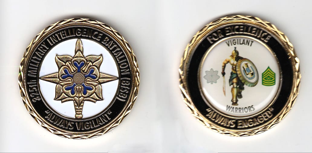 Round shaped, gold colored coin, 2 inches in diameter.