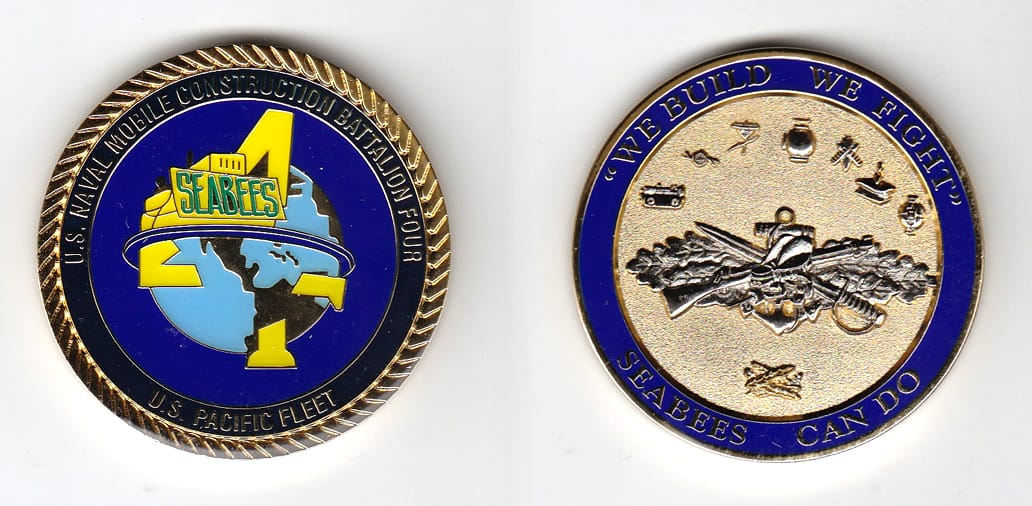 Round shaped, gold colored coin, 2 inches in diameter.