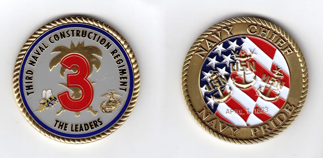 Round shaped, brass colored coin, 2 inches in diameter.