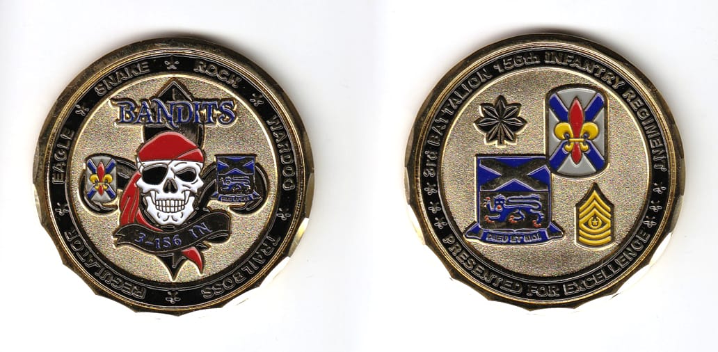 Round shaped, gold colored coin, 2 inches in diameter.