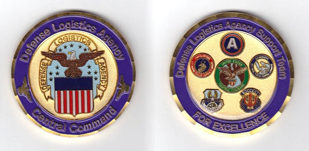 Round shaped, gold colored coin, 2 inches in diameter.