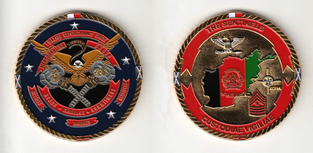 Round shaped, gold colored coin 2-1/4 inches in diameter.