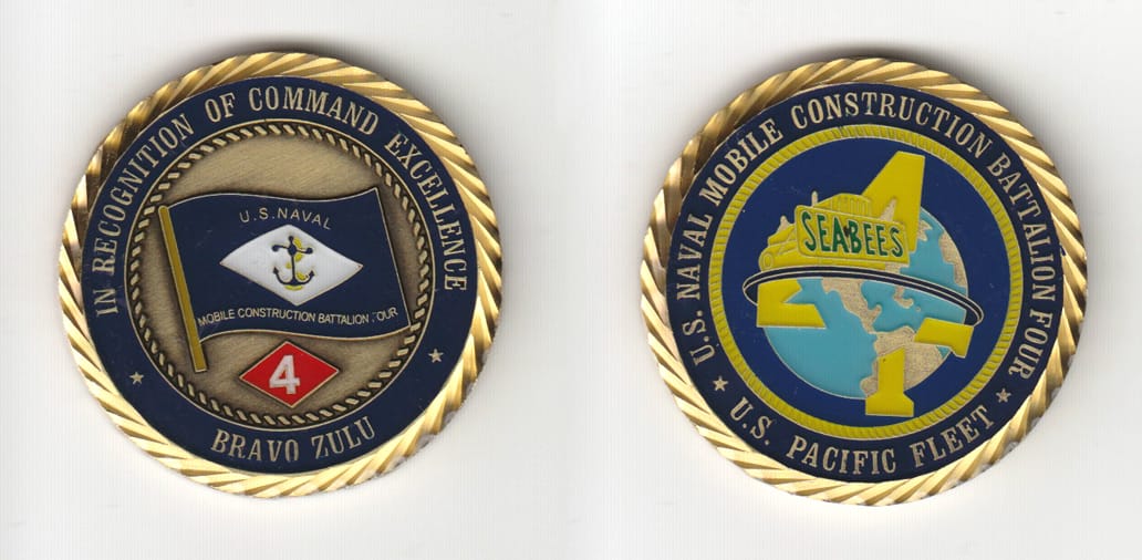 Round shaped, gold colored coin 1-1/2 inches in diameter.