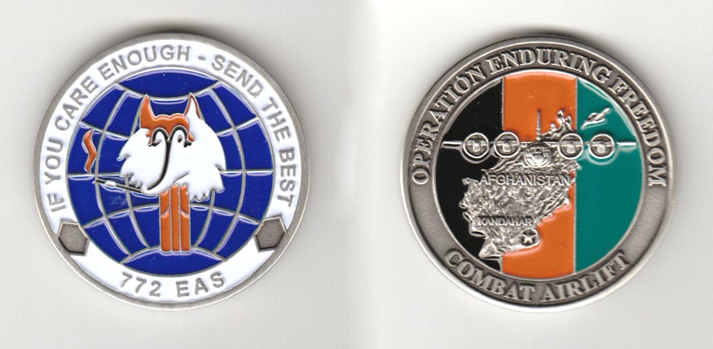 Round shaped, pewter colored coin 1-7/8 inches in diameter.