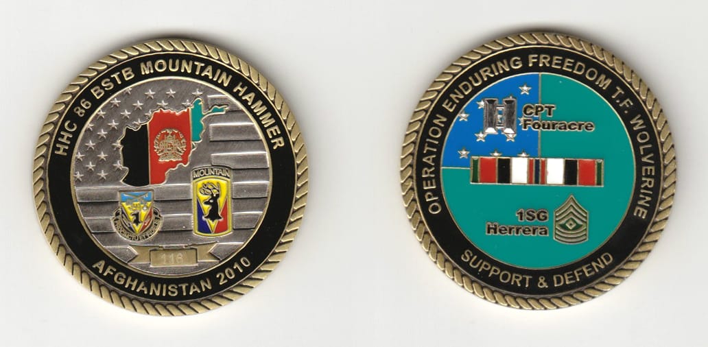 Round shaped, gold colored coin 1-3/4 inches in diameter.