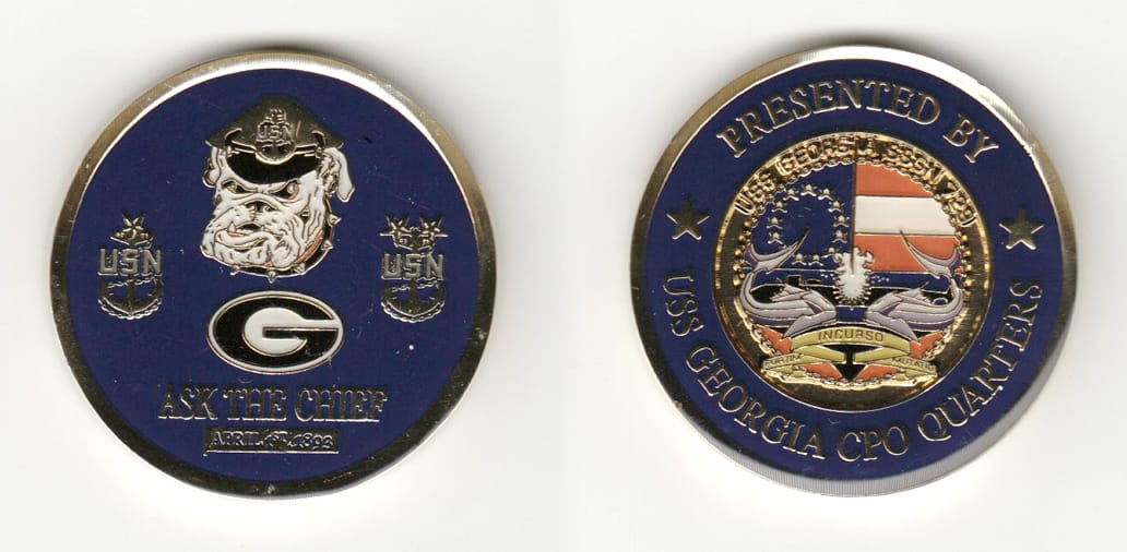 Round shaped, gold colored coin 1-3/4 inches in diameter.