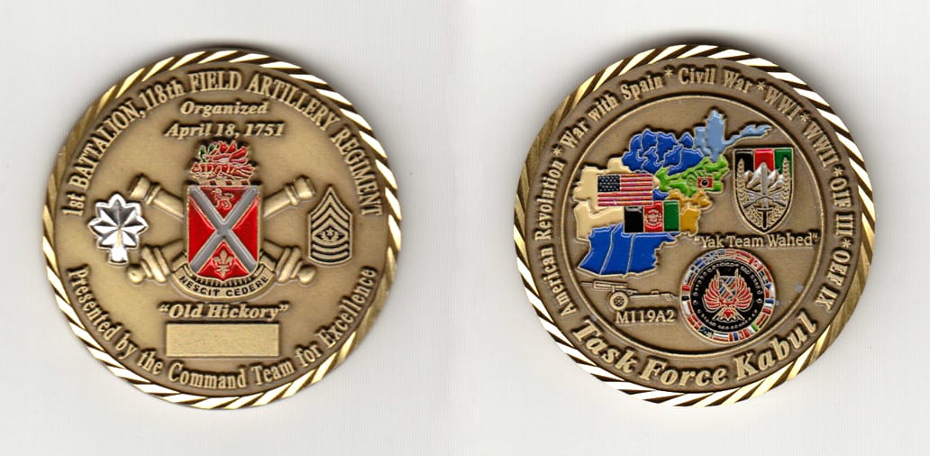 Round shaped, antique brass colored coin 1-3/4 inches in diameter.