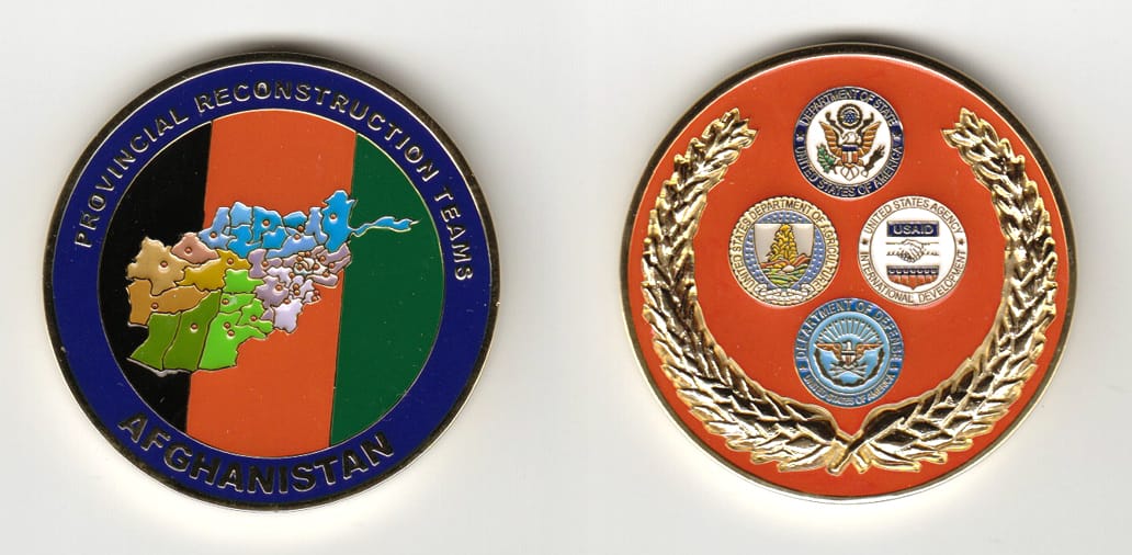 Round shaped, gold colored coin 1-3/4 inches in diameter.