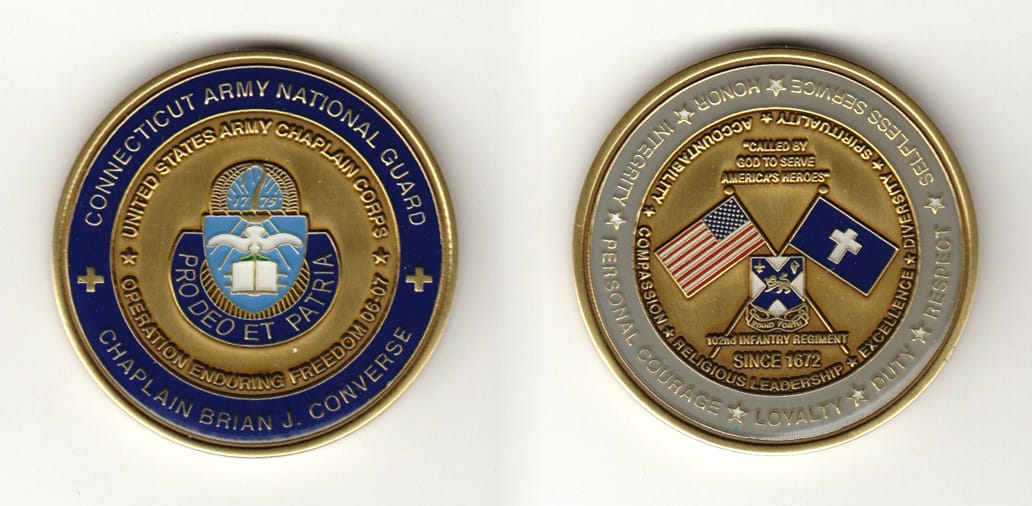 Round shaped, brass colored coin 1-3/4 inches in diameter.