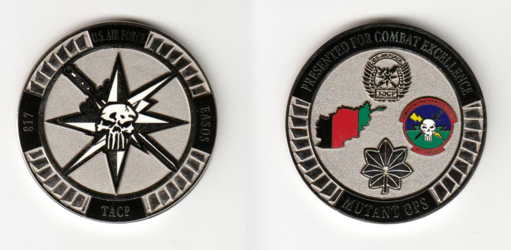 Round shaped, silver colored coin 1-3/4 inches in diameter.